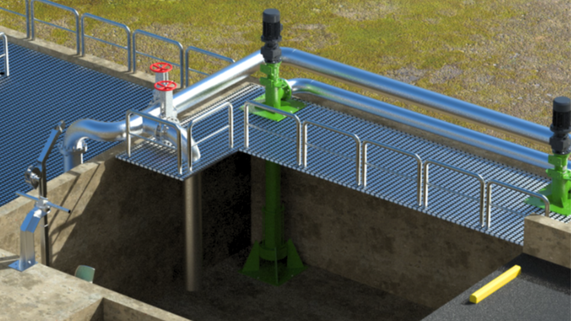 Plataforma industrial con tuberías, bombas y compuertas para alimentar digestores anaerobios, usada en plantas de tratamiento de aguas residuales para la codigestión de lodos y residuos orgánicos.